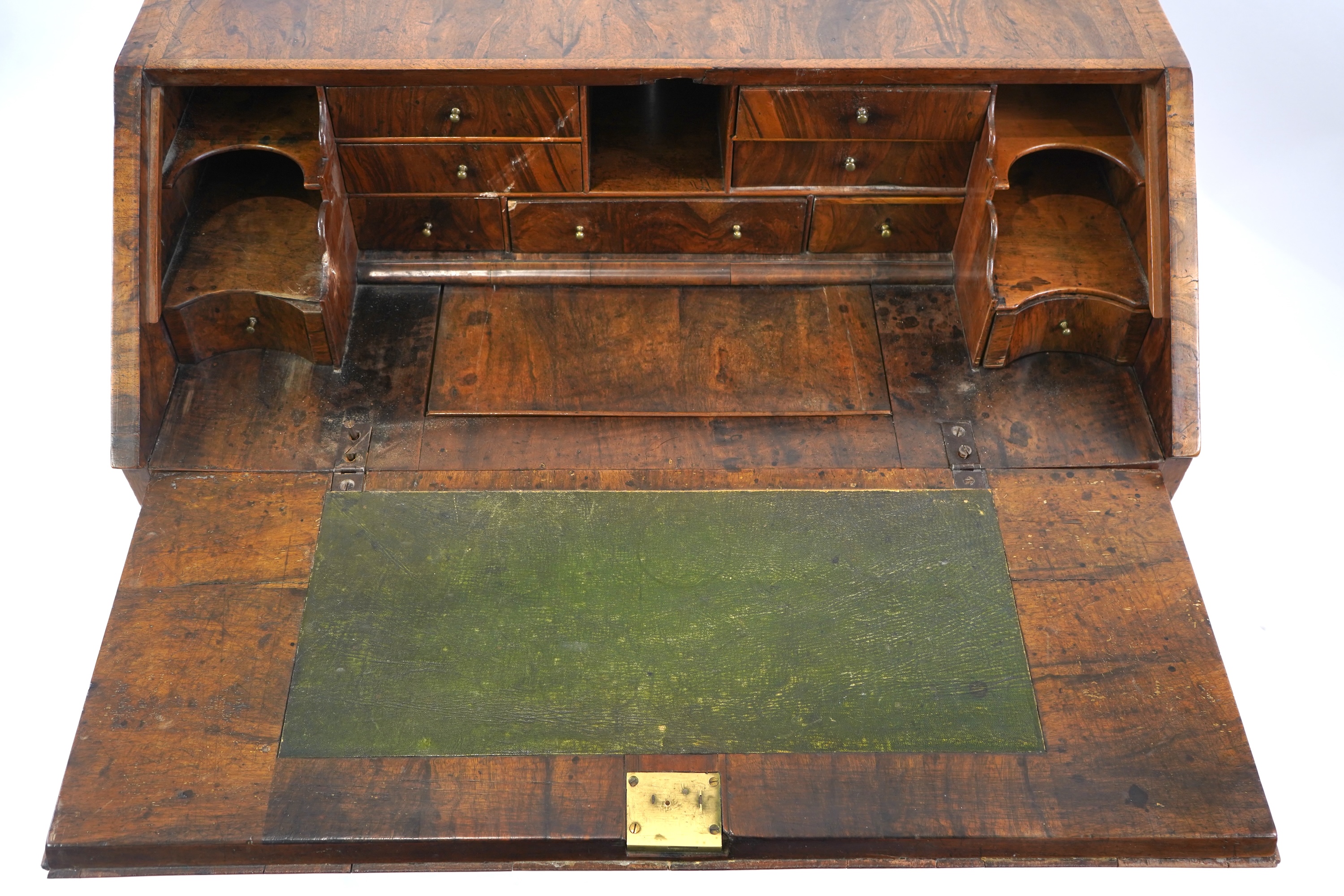 A George I feather banded walnut bureau